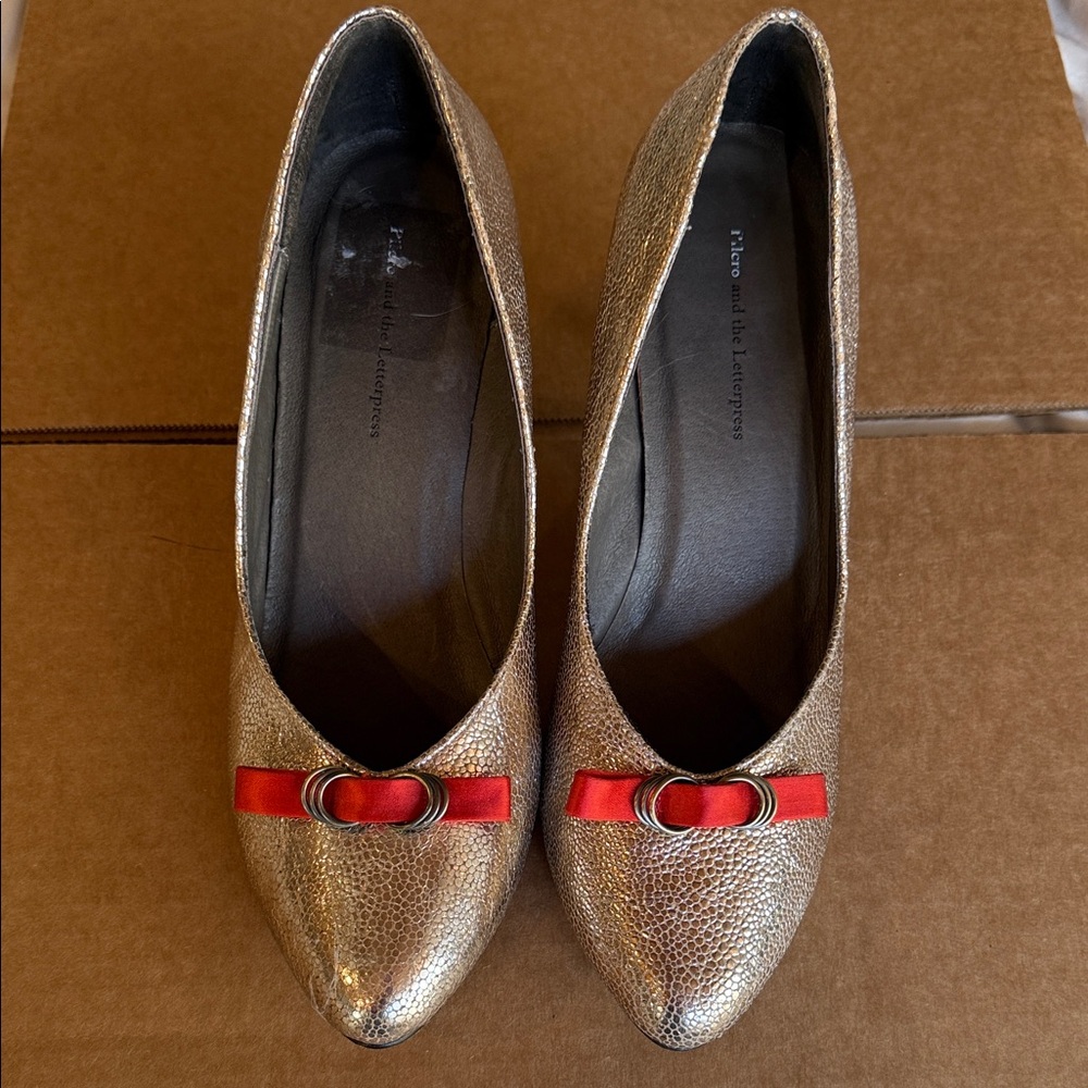 Pilcro and the Letterpress Metallic Heels with Red Bow
